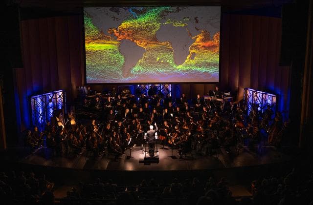 NASA image: National Philharmonic Performs Cosmic Cycles: A Space Symphony