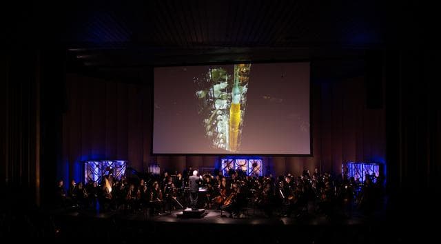 NASA image: National Philharmonic Performs Cosmic Cycles: A Space Symphony