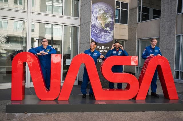 NASA image: Expedition 69 Crew Wears Solar Eclipse Glasses