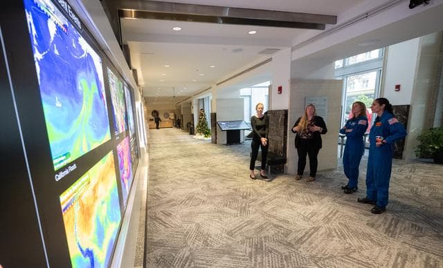 NASA image: Expediton 70 Astronauts visit Earth Information Center