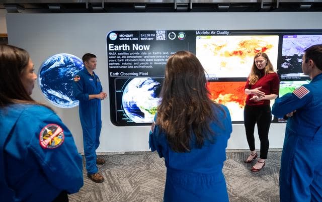 NASA image: Expedition 71 Astronauts Visit Earth Information Center