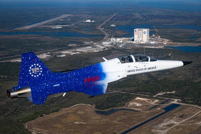 NASA image: Administrator Isaacman and Secretary Hegseth Fly Over Kennedy