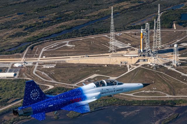 NASA image: Administrator Isaacman and Secretary Hegseth Fly Over Kennedy