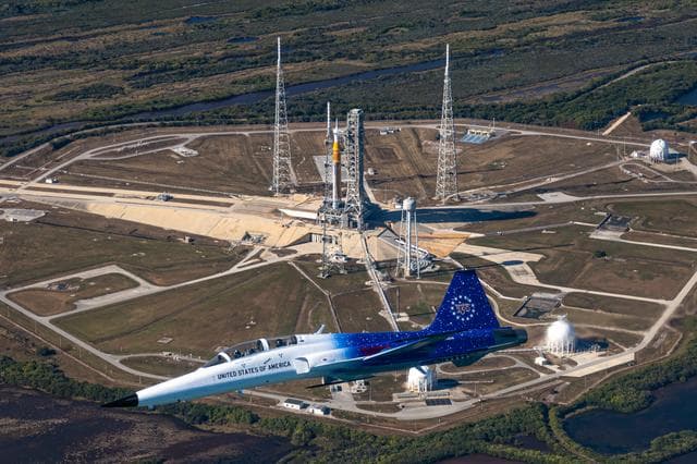 NASA image: Administrator Isaacman and Secretary Hegseth Fly Over Kennedy