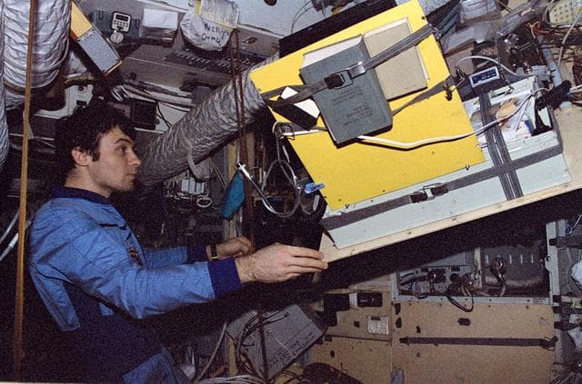 NASA image: Dezhurov performs in-flight maintenance in Mir Core module