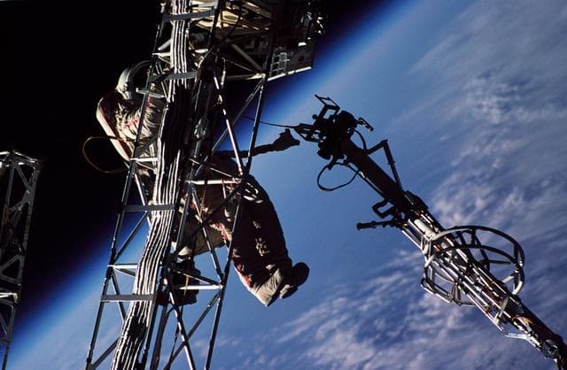 NASA image: Mir 21 cosmonauts assemble a truss during EVA