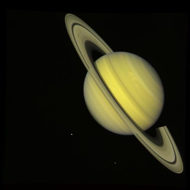 NASA image: Saturn With Rhea and Dione True Color