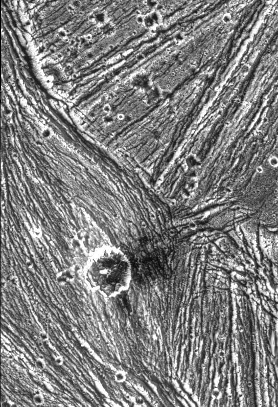 NASA image: Ganymede - Mixture of Terrains and Large Impact Crater in Uruk Sulcus Region