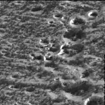 NASA image: Ice-frosted crater tops on Ganymede