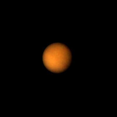 NASA image: Titan Brighter Southern Hemisphere
