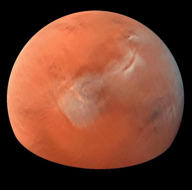 NASA image: Clouds over Tharsis