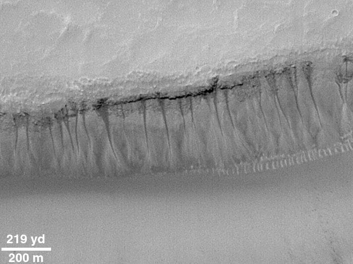NASA image: Evidence for Recent Liquid Water on Mars:Weeping Layer in Gorgonum Chaos