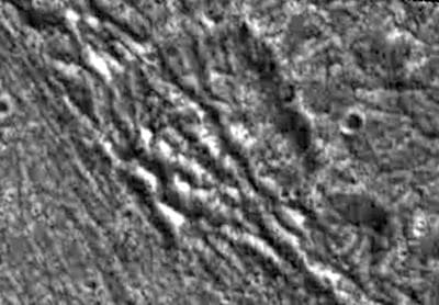 NASA image: Fractured Craters on Ganymede