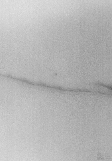 NASA image: Cloudy Image of Cerberus Rupes Dark Lineation