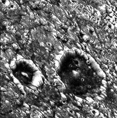 NASA image: Dark-floored Impact Craters on Ganymede