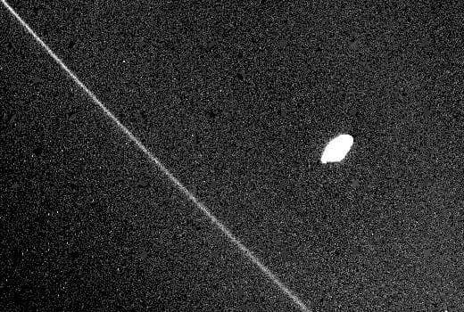 NASA image: Saturn F-ring and Inner Satellite