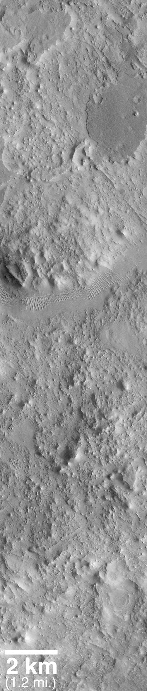 NASA image: Eroded, Layered Cratered Highlands of Eastern Arabia Terra