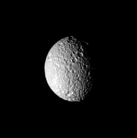 NASA image: Mimas - cratered surface