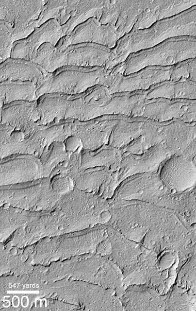 NASA image: Ancient Paleo-Dunes Battered by Impact Craters