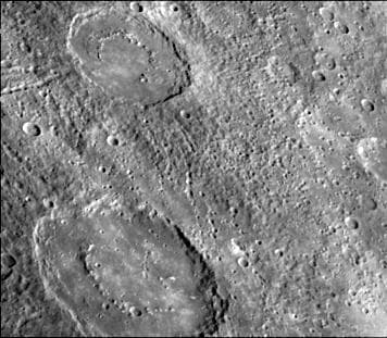 NASA image: Crater Chain Groves Inside Larger Craters