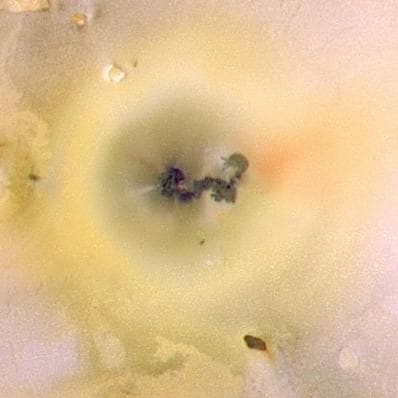NASA image: Close-up of Prometheus, Io color