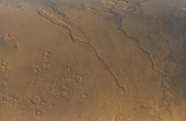 NASA image: Looking Out Across Dao, Niger, and Harmakhis Valles