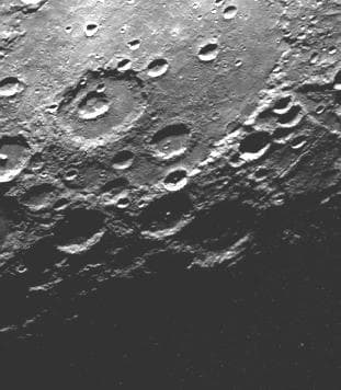 NASA image: Large Circular Basin Flooded and then Cratered
