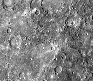 NASA image: Small Craters Engulfed by Smooth Plains