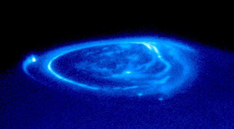 NASA image: Satellite Footprints Seen in Jupiter Aurora