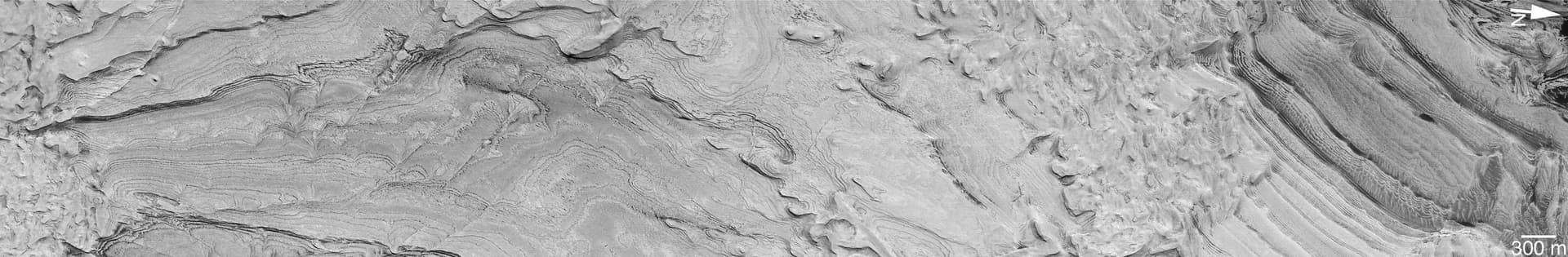 NASA image: Spectacular Layers Exposed in Becquerel Crater