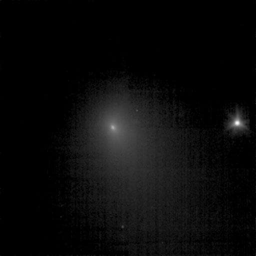 NASA image: Tempel Poses Next to a Star