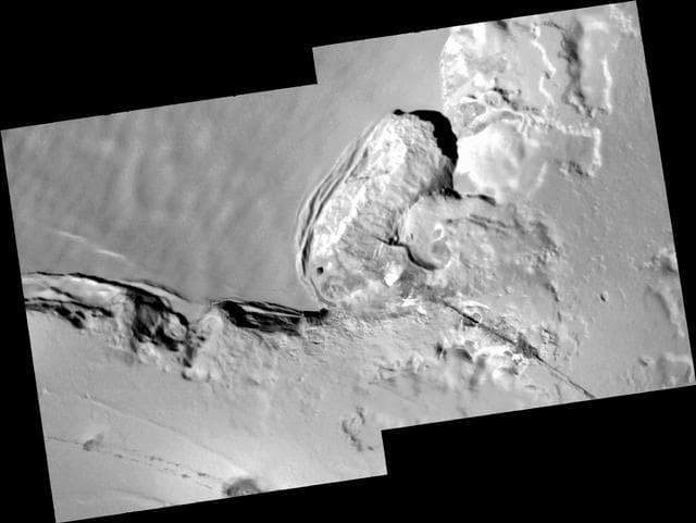 NASA image: Collapsing Cliff at Telegonus Mensa, Io