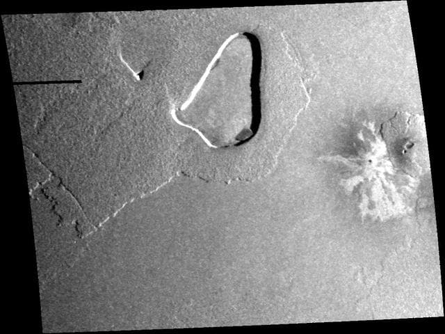NASA image: Volcanic Depression and Shield Volcano, Io