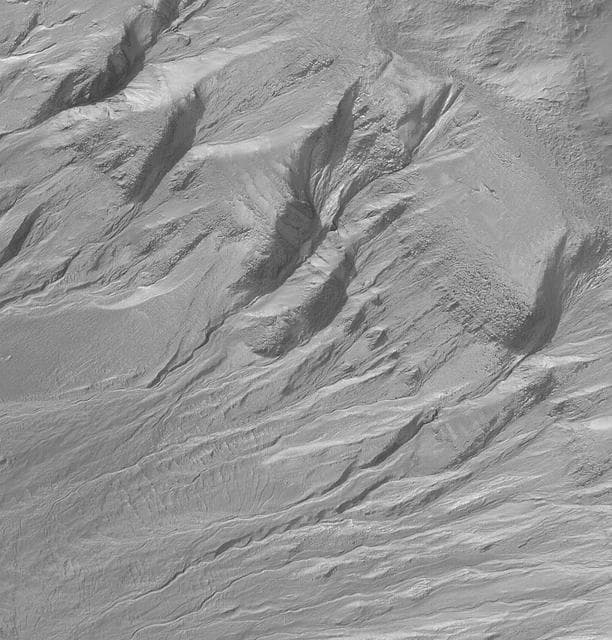 NASA image: Gullies and Layers in Crater Wall in Newton