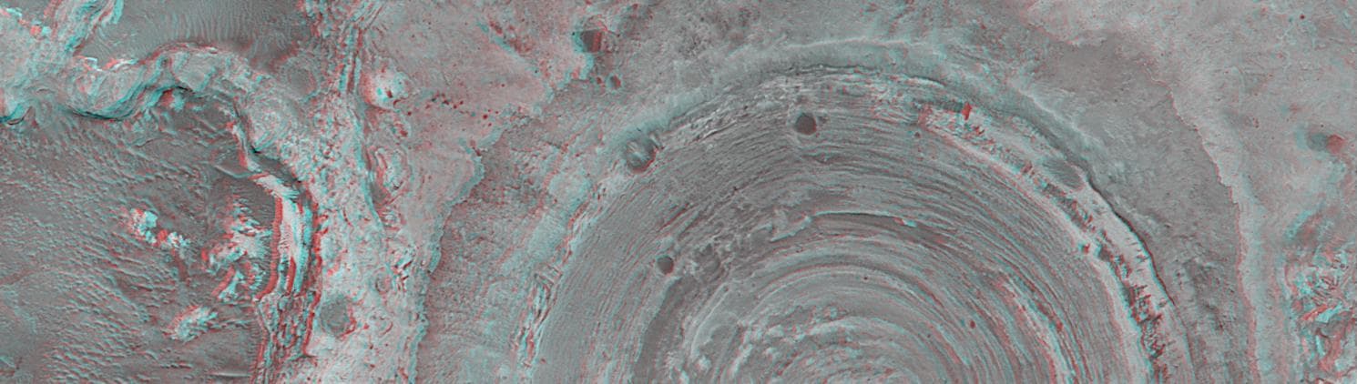 NASA image: Partially-Exhumed Crater in Northern Terra Meridiani: Stereo Anaglyph of overlapping coverage in M04-01289 and E17-01676