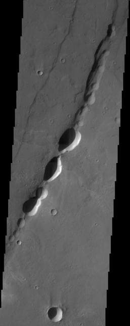 NASA image: Pit-chain in Noctis Labyrinthus