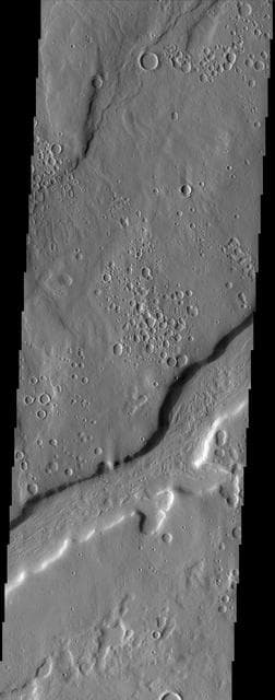 NASA image: Ismenia Fossae: Craters or Pits?