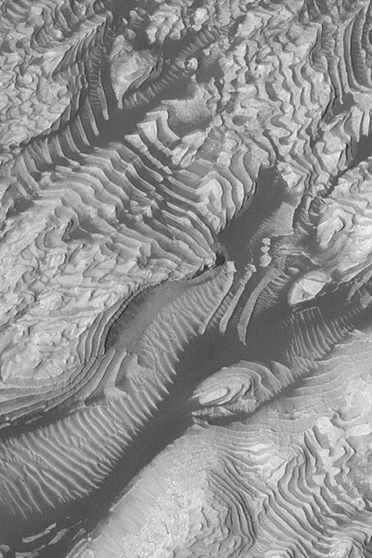 NASA image: Layers in 8°N, 7°W Crater