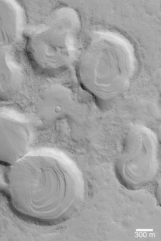 NASA image: Layers in Crater Cluster