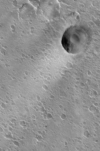 NASA image: Crater and Wind Streak