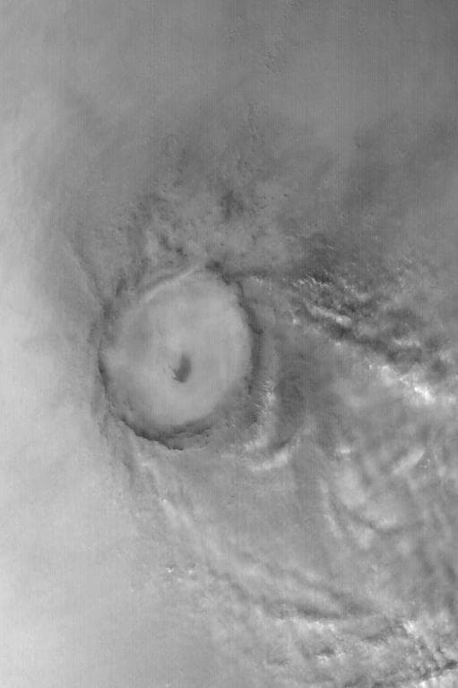 NASA image: Clouds Near Mie Crater