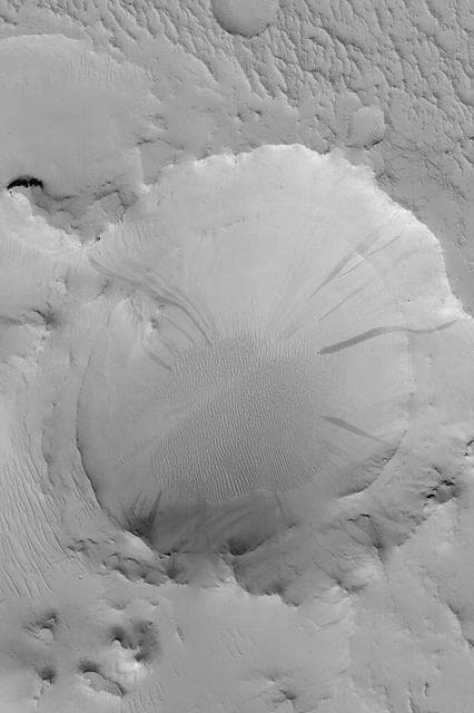 NASA image: Exhumed Crater with Slope