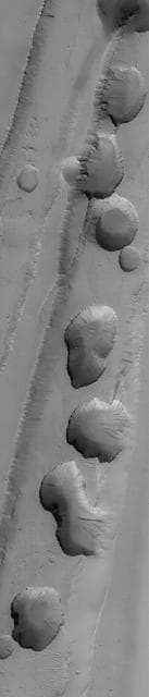 NASA image: Tractus Fossae Pit Chain