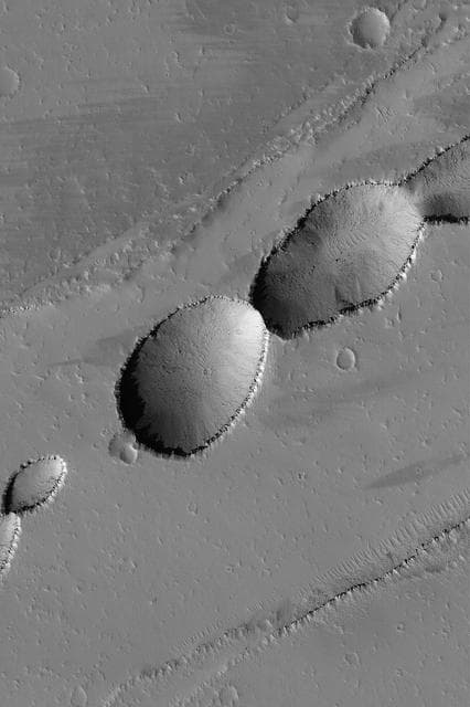 NASA image: Pits Near Rhabon Valles