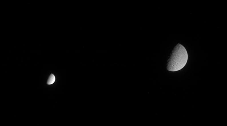 NASA image: Rhea and Enceladus