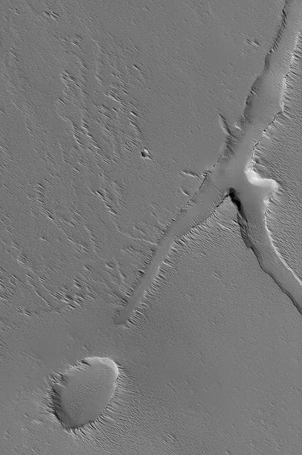 NASA image: Troughs Near Ascraeus