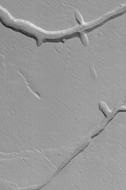 NASA image: Gordii Fossae Troughs