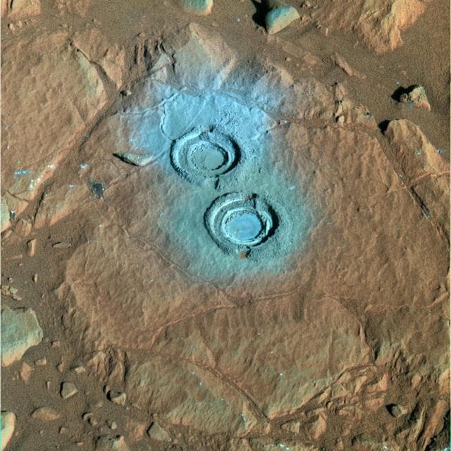 NASA image: Two Holes in Wooly Patch False Color
