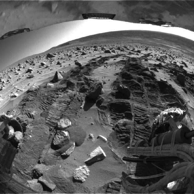 NASA image: Potato-size Rock in Spirit Wheel Well