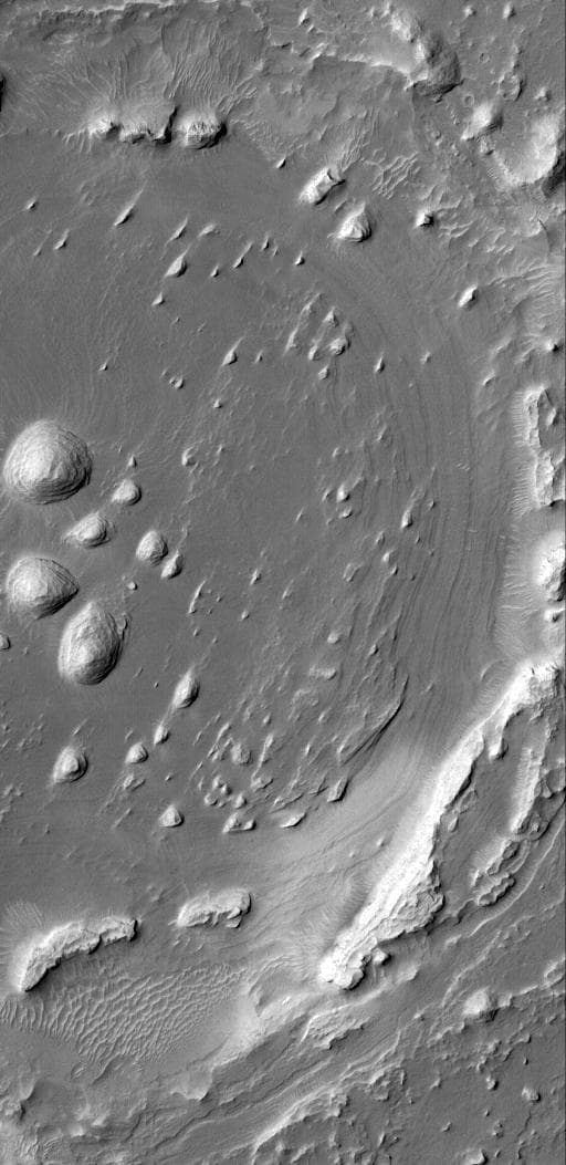 NASA image: Layers and Exhuming Crater